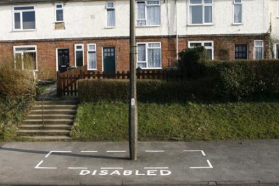 a-council-paint-a-disabled-parking-area-around-a-lampost-pic-dm-574023350.jpg